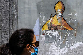 نقاشی بر دیوار ساختمانی در ناپولی، ایتالیا