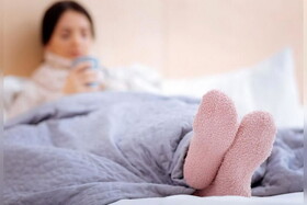 خوابیدن با جوراب برای سلامتی مفید است یا مضر؟